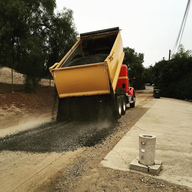 truck dumping asphalt