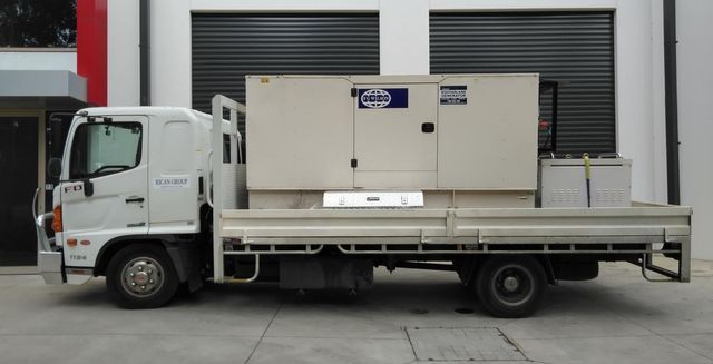Silent generator being towed to the project site