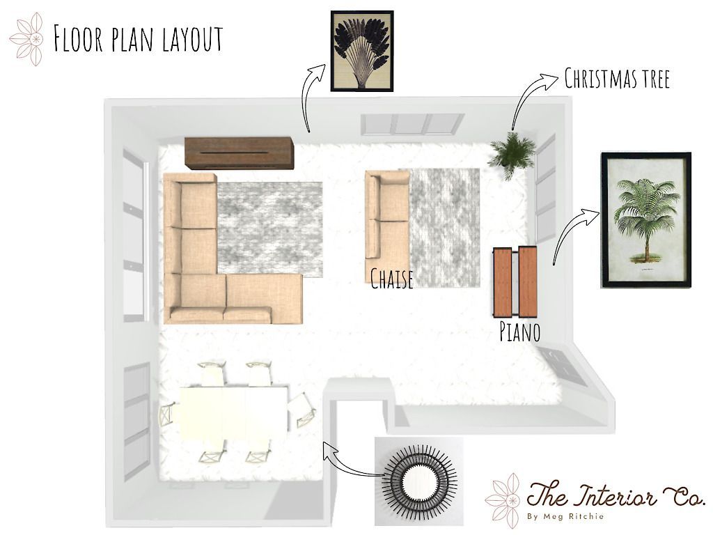An aerial view of a living room with a couch and a table.