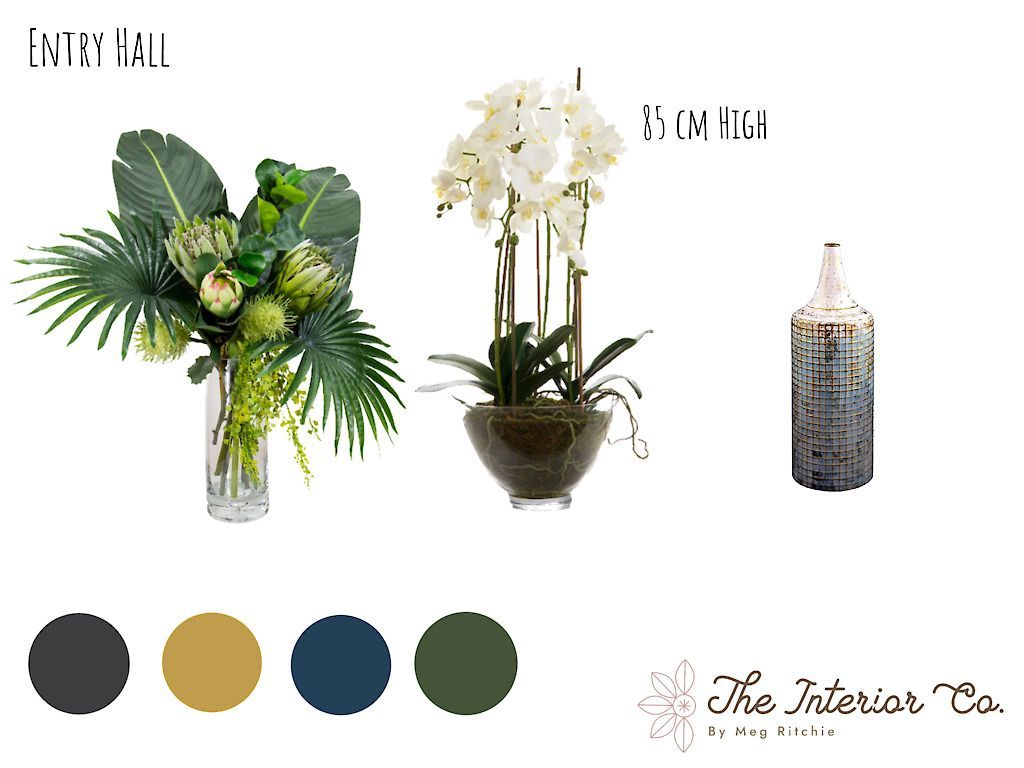 There are three different types of flowers in a vase.