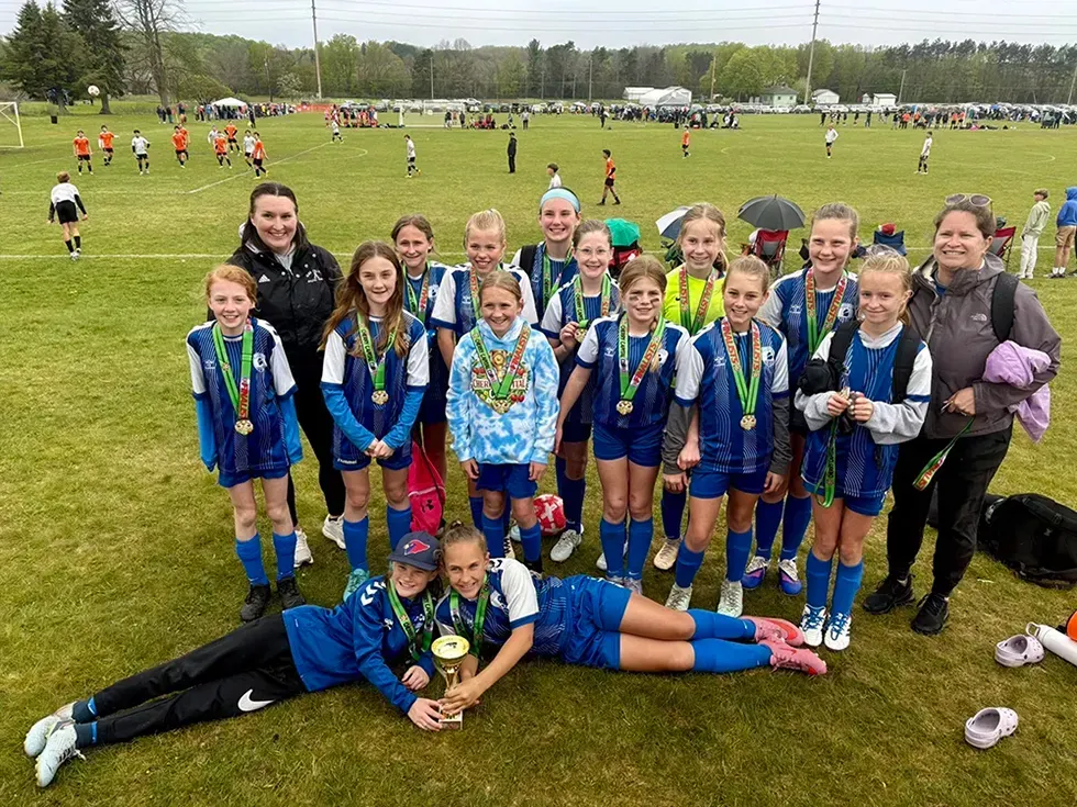 Youth  team in blue uniforms 