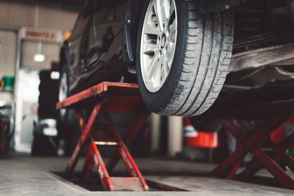 Car Lifting in Auto Shop — Wells, ME — Wells Auto Care
