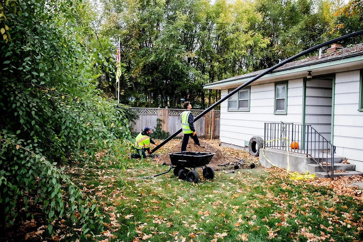 Trenchless technicians repairing sewer