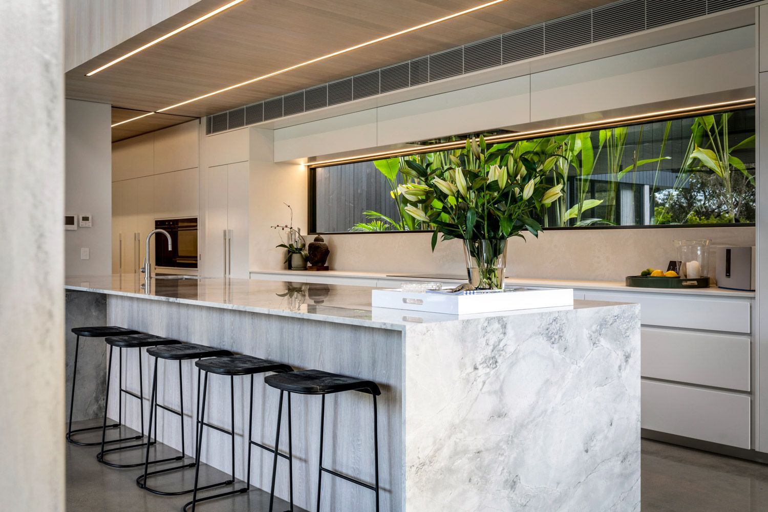Marble Benchtop with Black and Wooden Stools -  Benchtops on the Sunshine Coast, QLD