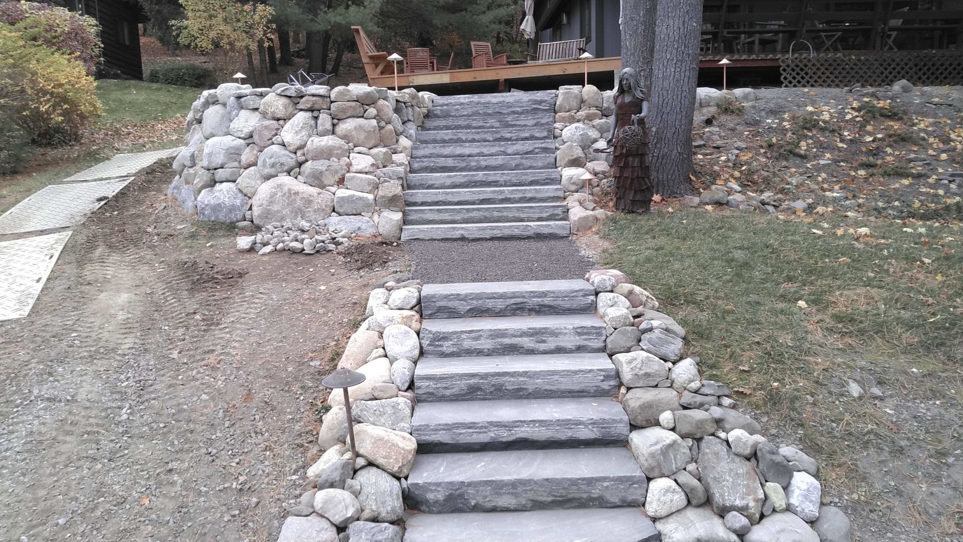 A set of stone stairs leading up to a house