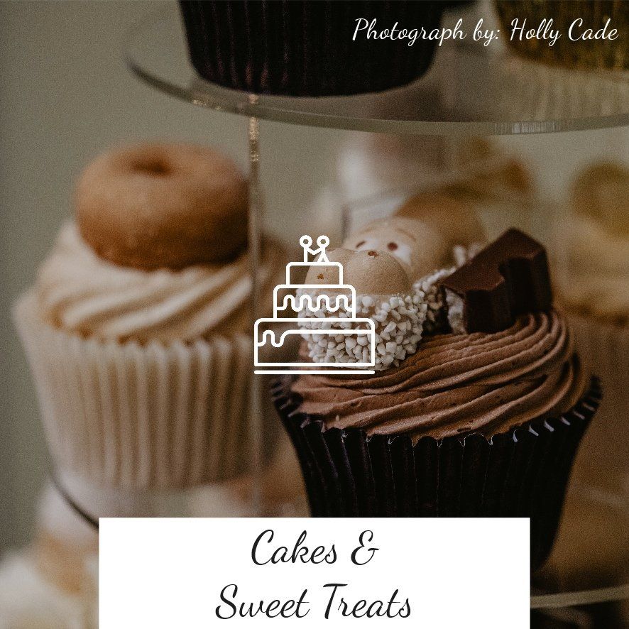 Cupcakes on a tiered stand, with chocolate frosting and sweet treats.