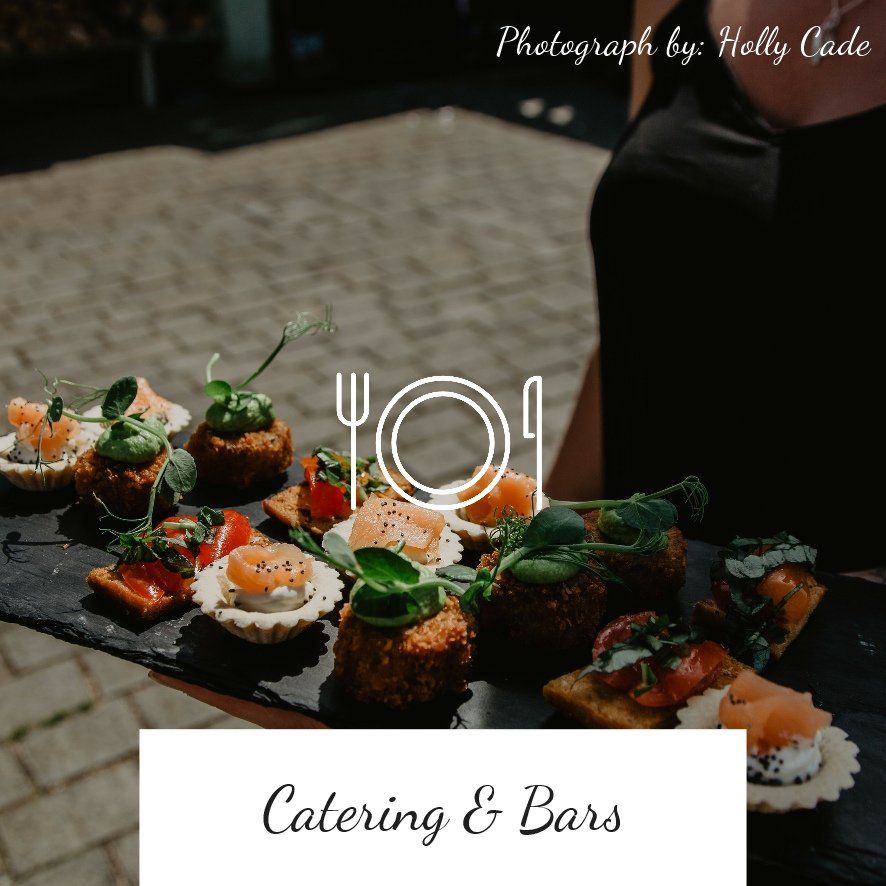 A person holding a tray of appetizers with