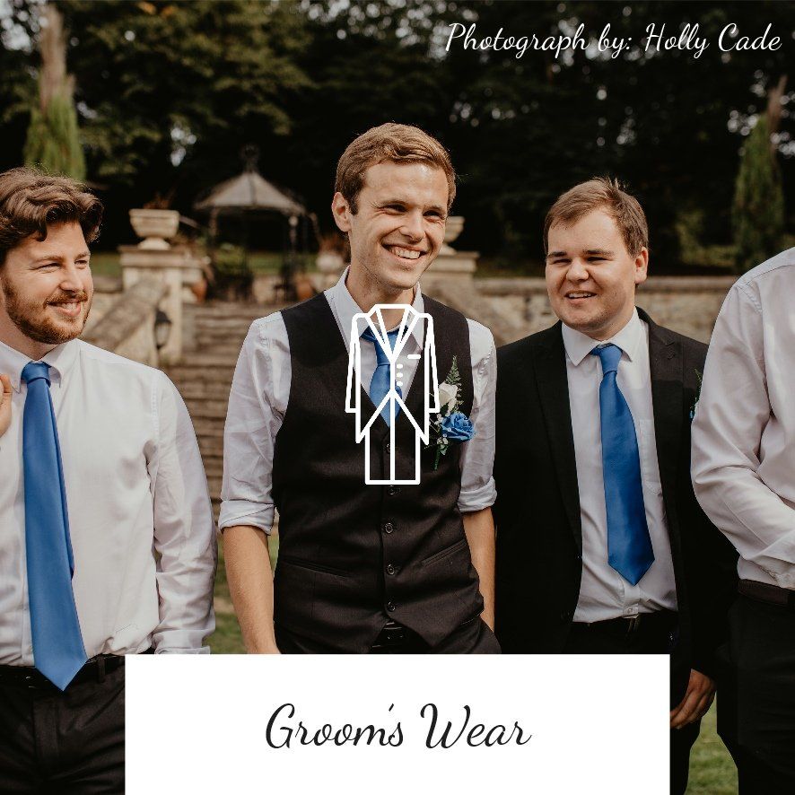 Groomsmen in black suits and vests with blue ties smile outside. Text: Grooms Wear.