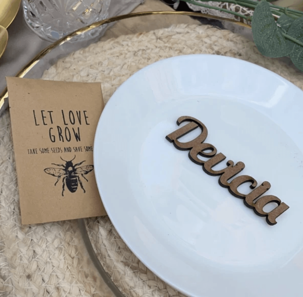 A place setting with a seed packet that says