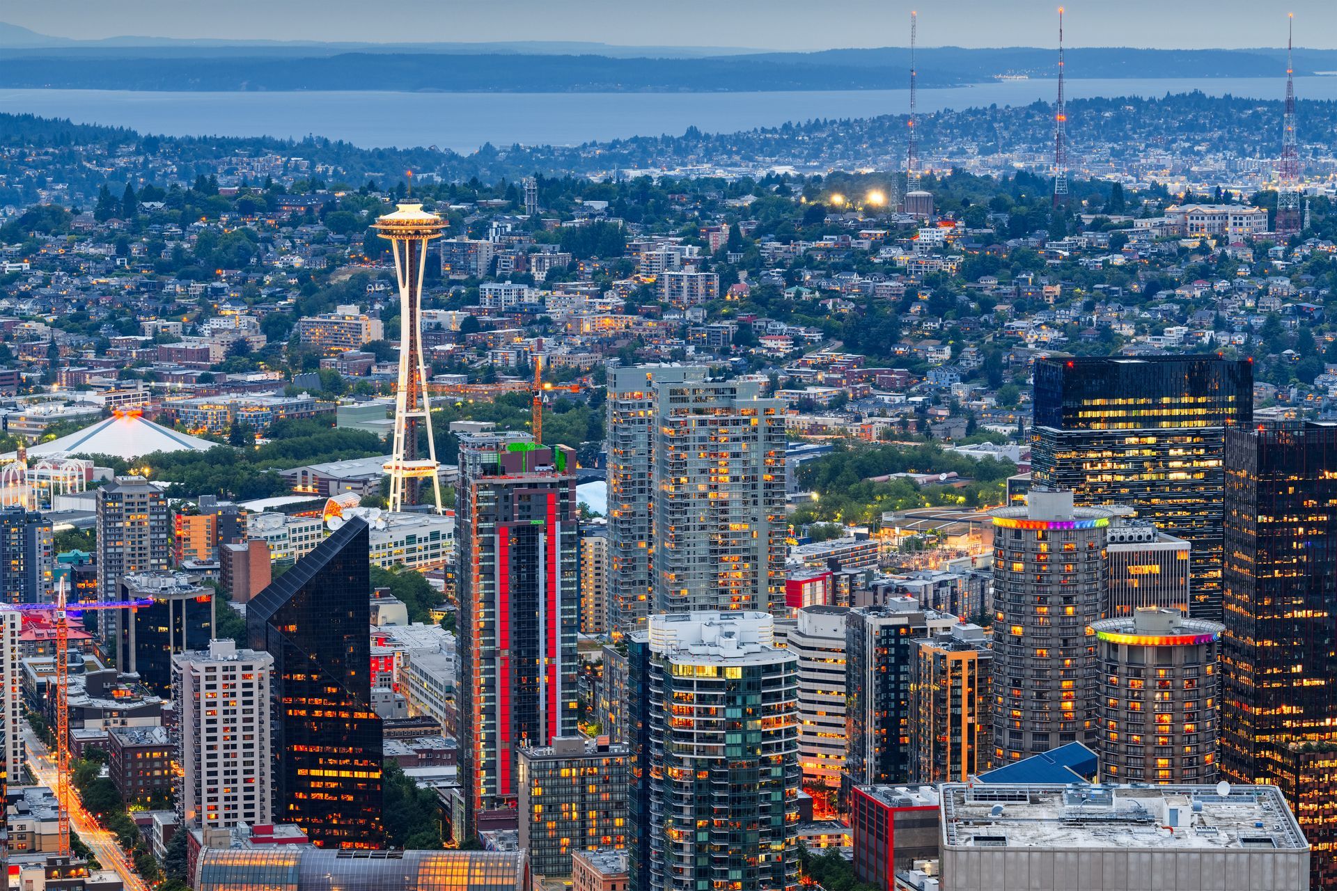 An aerial view of a city with the space needle in the background