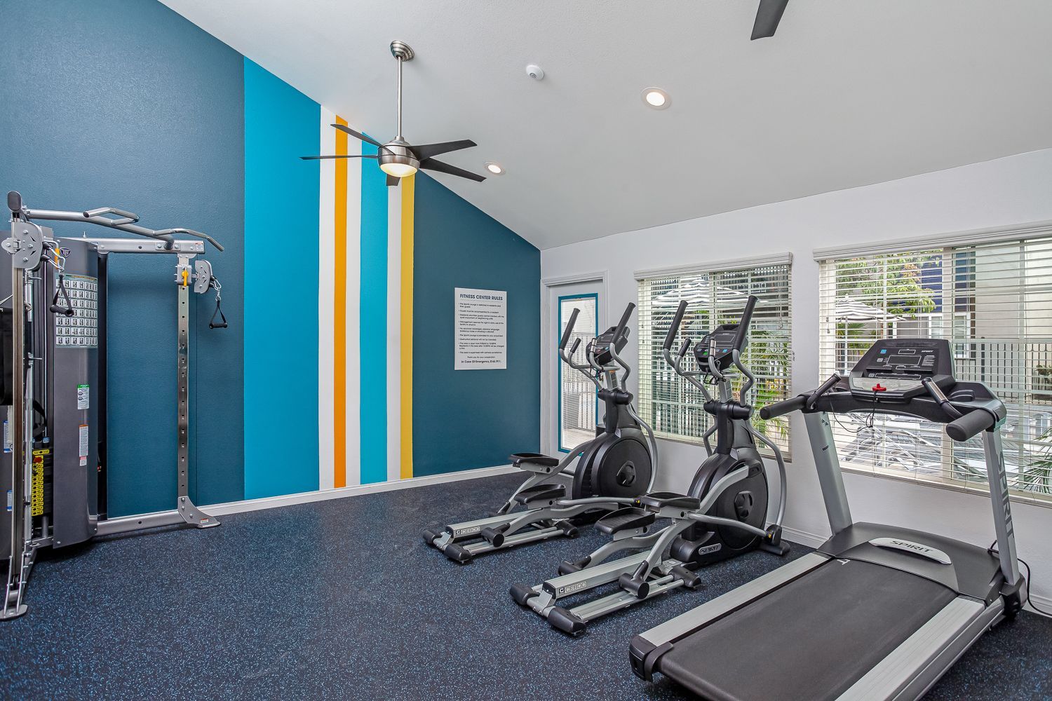 fitness center with cardio machines