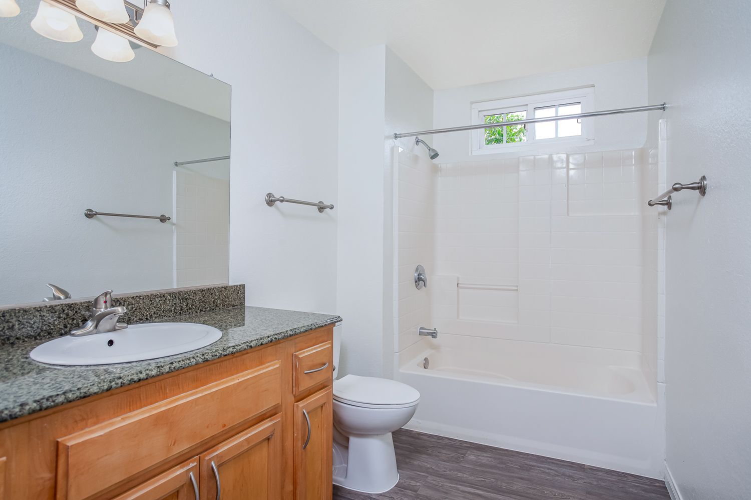 apartment bathroom with shower and toilet