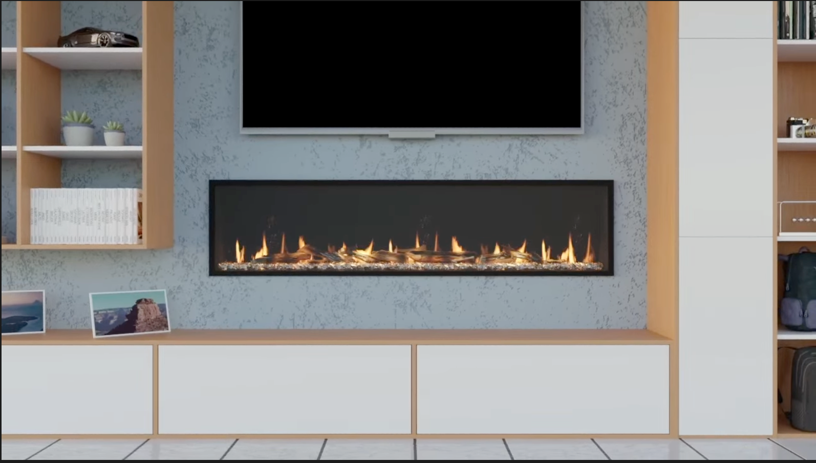 Living room with fireplace, TV, and built-in storage on a light gray wall.