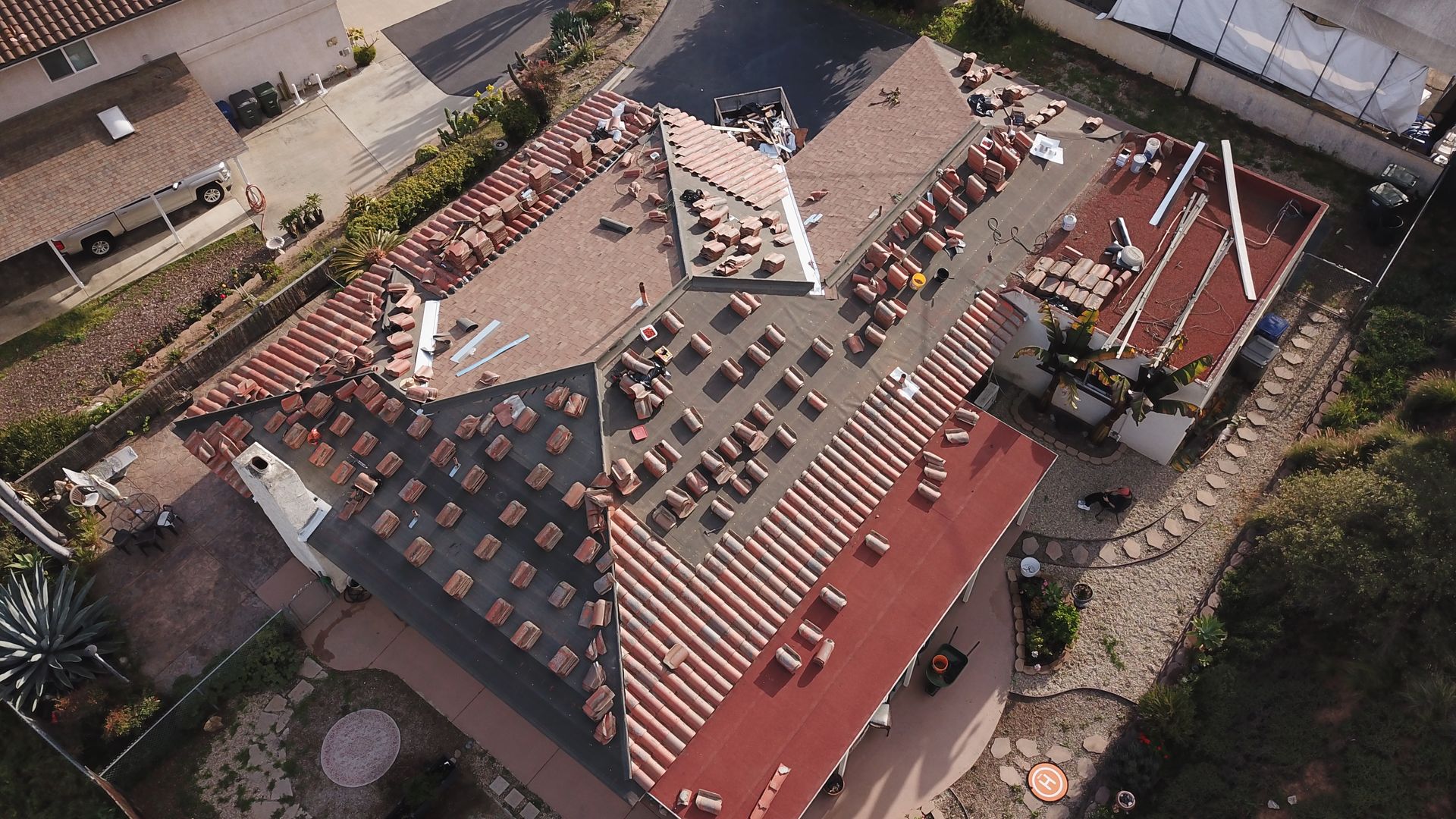 Before-After-Tile-Roof-Upgrade-Solar-Panel-Installation-Roof-King