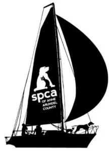 Black and white silhouette of a sailboat with the SPCA logo on the sail and dogs on deck.