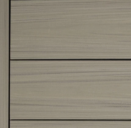 Two wooden planks side-by-side: a smooth, grey one and a weathered, brown one with a rough edge.