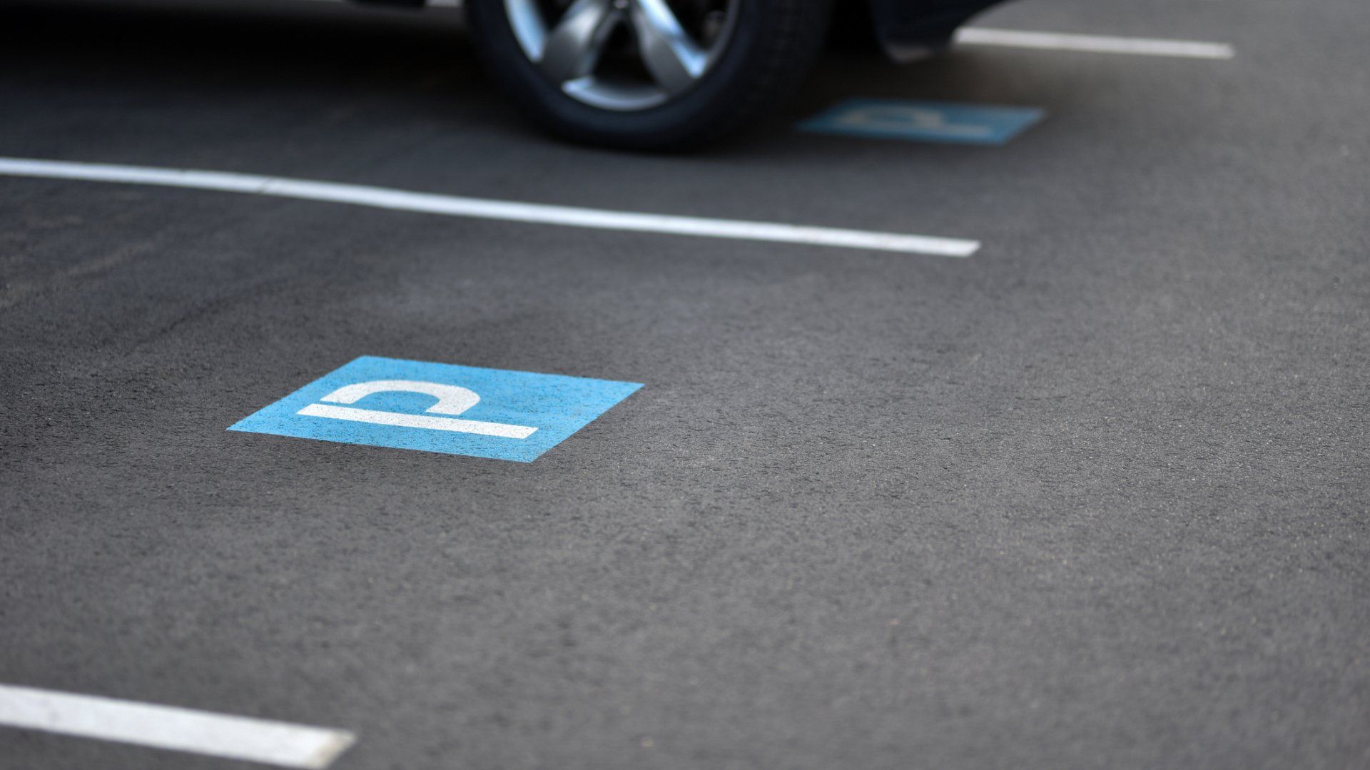 Painted parking sign on asphalt - Wendell, NC l Champ's Paving & Seal Coating INC Painted parking sign on asphalt - Wendell, NC l Champ's Paving & Seal Coating INC