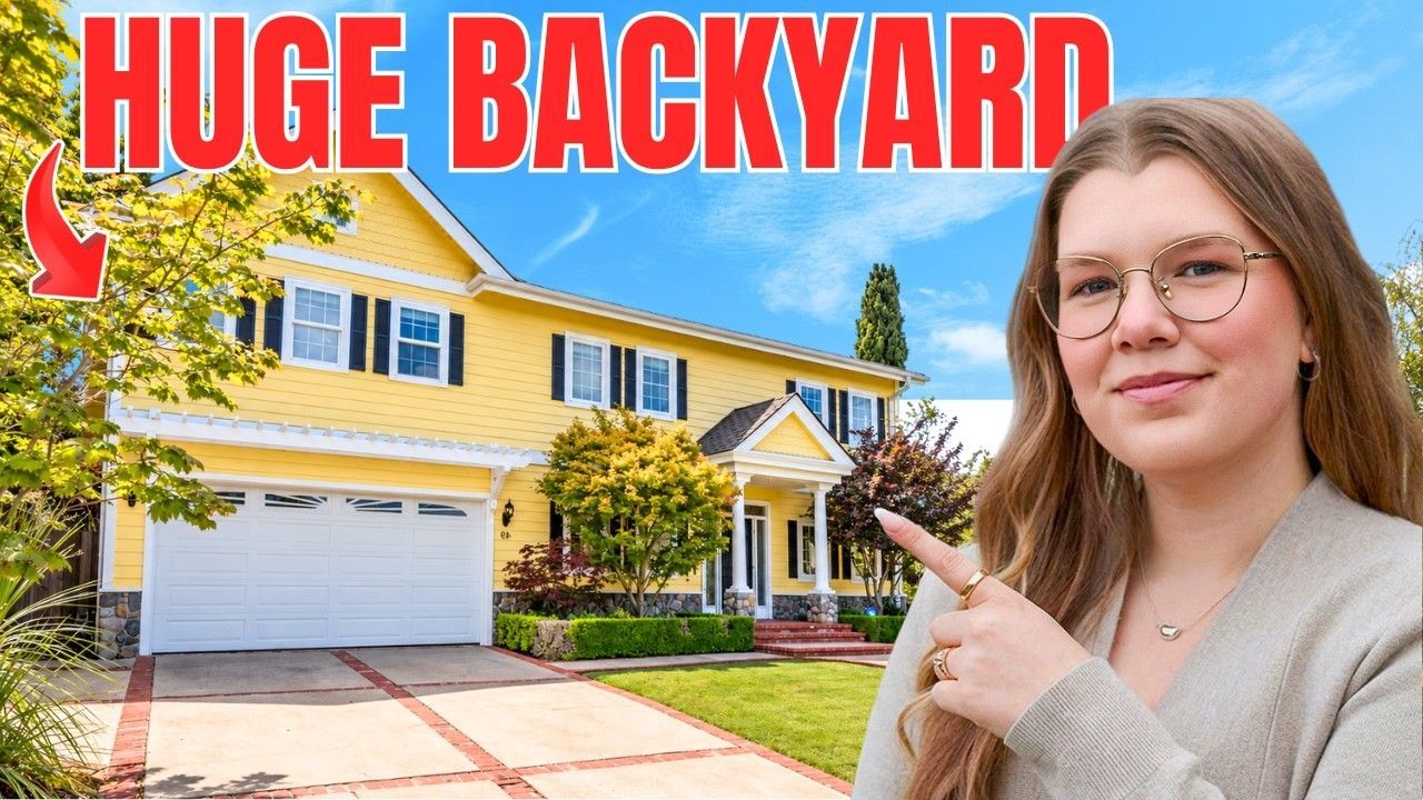 Jessica Heredia outside a yellow colonial-style home in Emerald Hills, Redwood City, CA