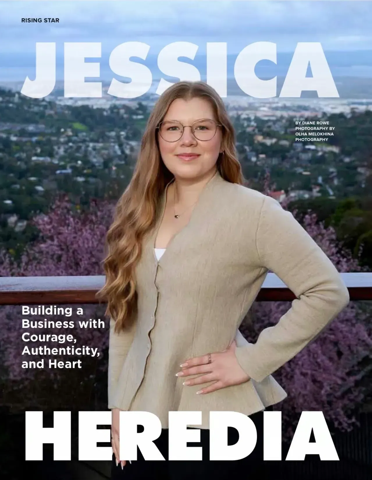 Magazine cover featuring Jessica Heredia standing outdoors with a city view behind her.