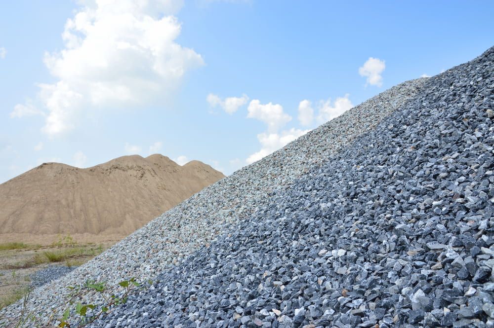 A Pile Of Gravel With A Mountain In The Background — Macquarie Valley Rock & Sand In Narromine, NSW