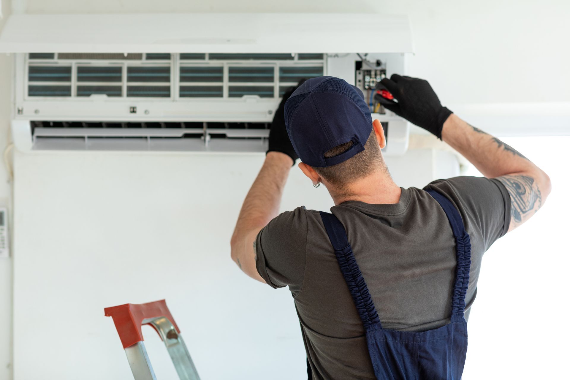 Technician Repairing Air Conditioner | Batemans Bay, NSW