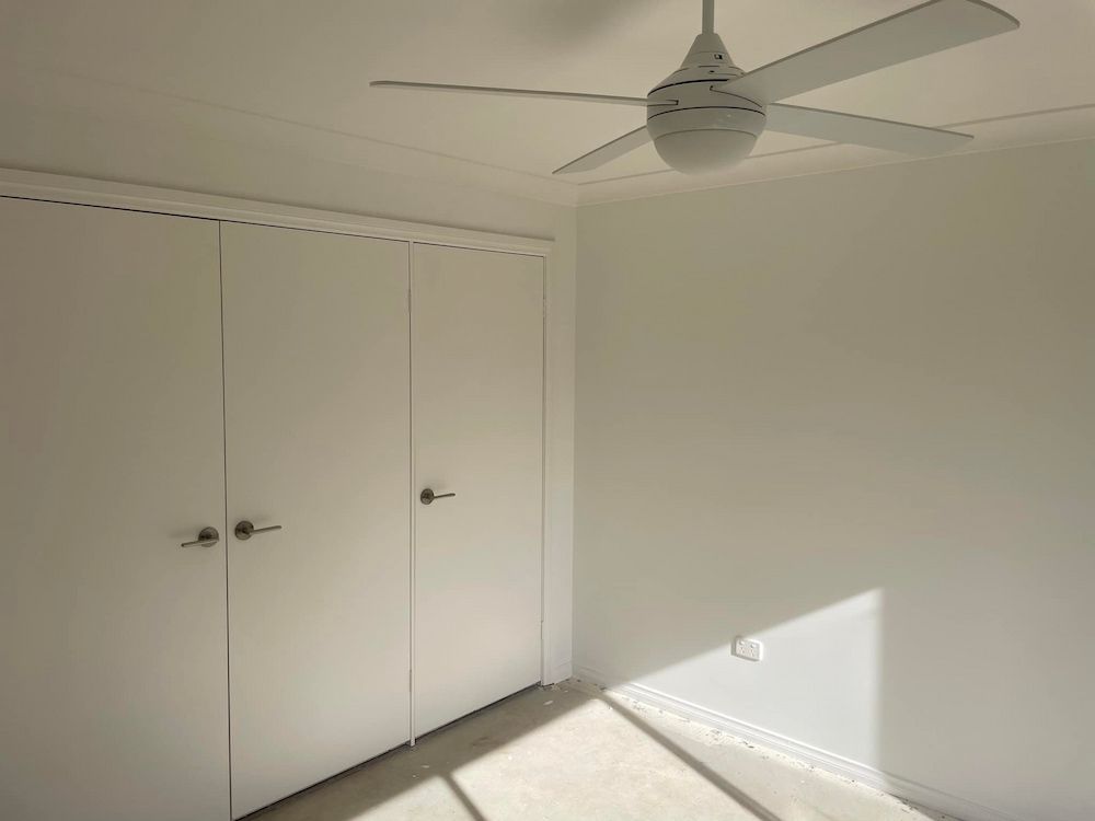 There is a Ceiling Fan in the Corner of the Room — Cornall Painting Services in Lake Cathie, NSW