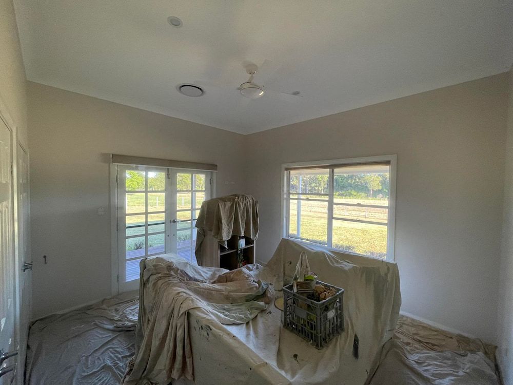 A Room is Being Painted in a House — Cornall Painting Services in Wauchope, NSW