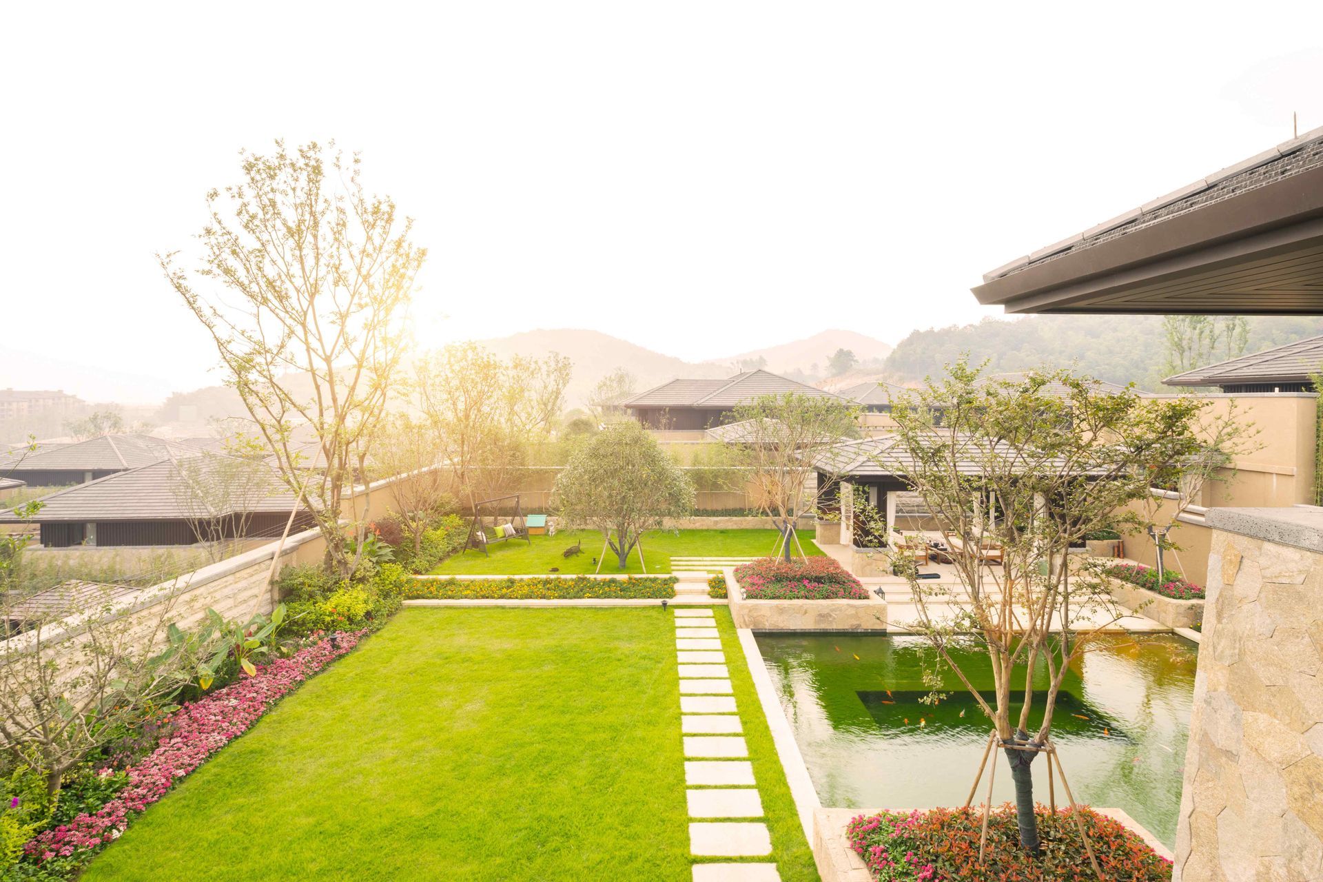 A completed landscape project with a turf lawn