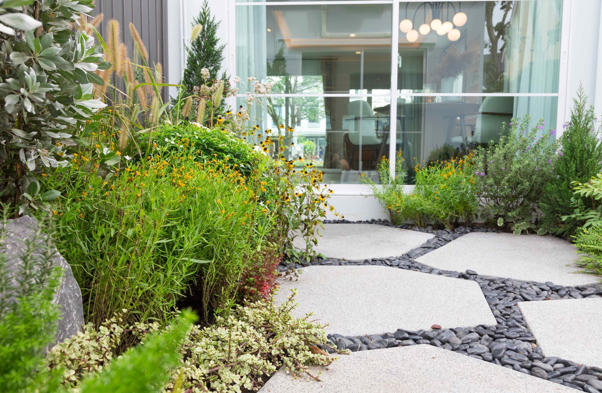 Paver pathway by bushes