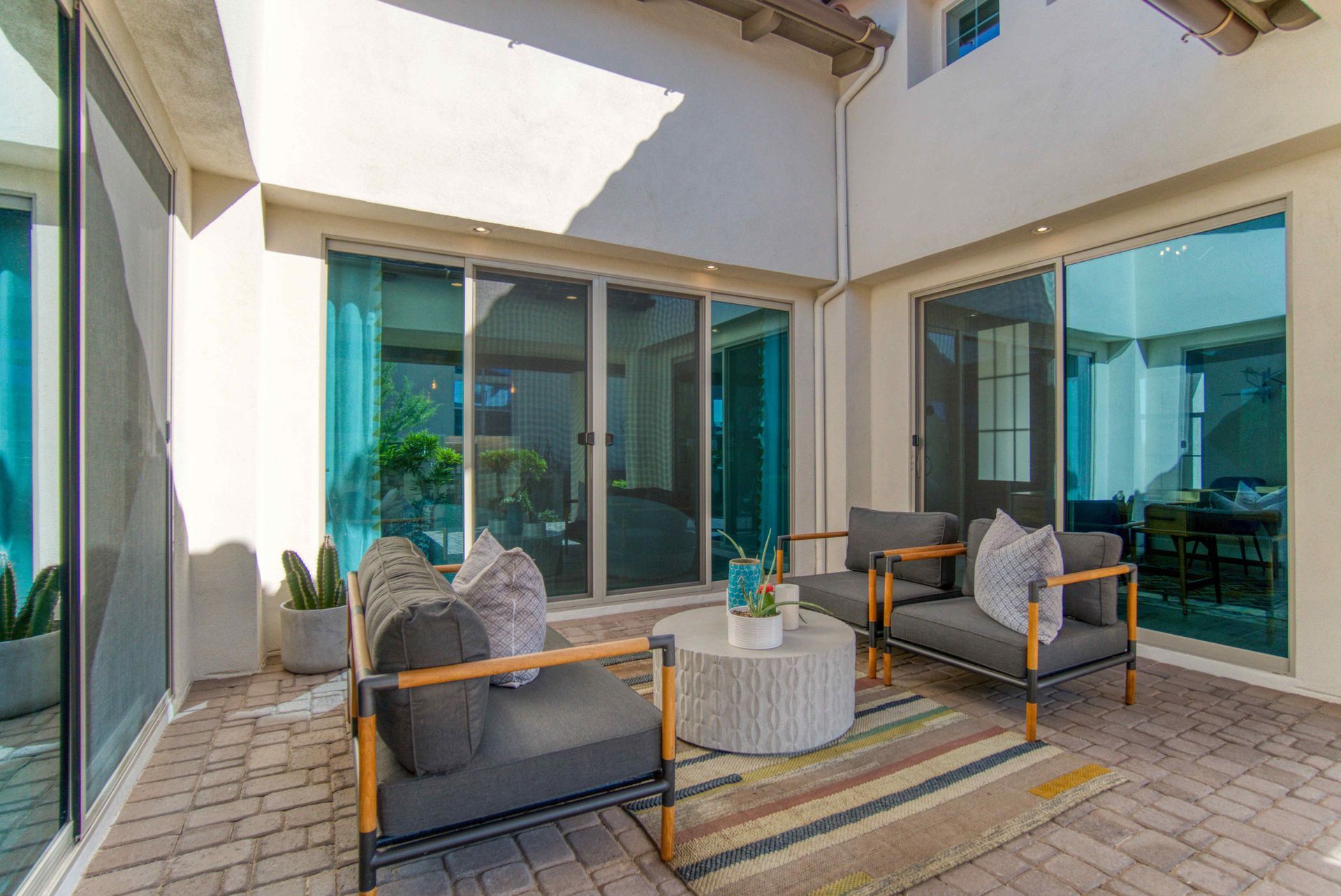 Chairs surrounding a table in an outdoor living space