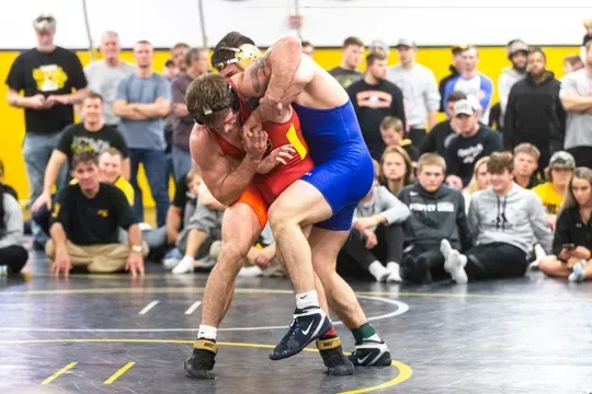 Iowa's Cash Wilcke, left, wrestles Abe Assad during the second day of preseason Hawkeye wrestling matches, Friday, Nov., 8, 2019, inside the Dan Gable Wrestling Complex at Carver-Hawkeye Arena in Iowa City, Iowa.