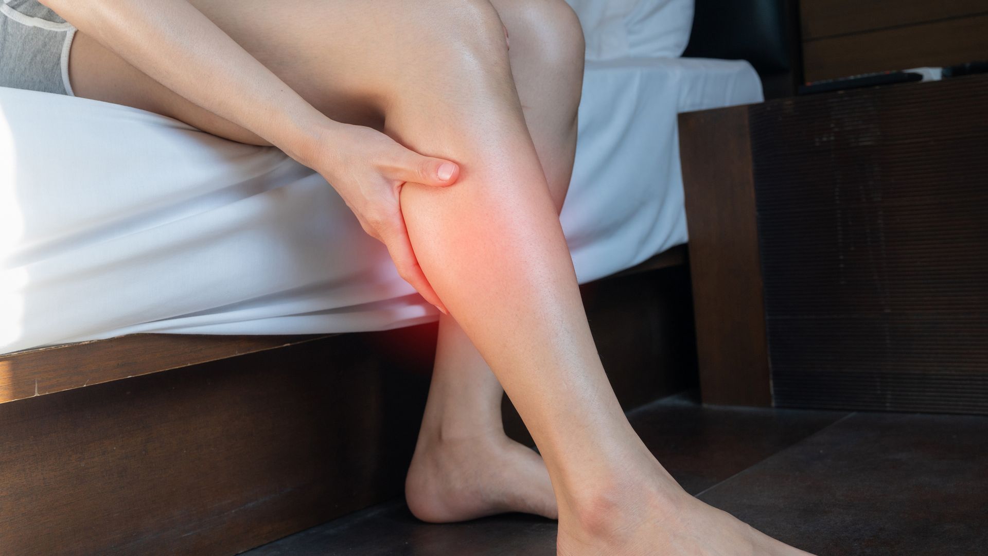 Woman Suffering from Calf Pain - New Bloomfield, PA - Mulhollem Chiropractic Clinic Woman Suffering from Calf Pain - New Bloomfield, PA - Mulhollem Chiropractic Clinic