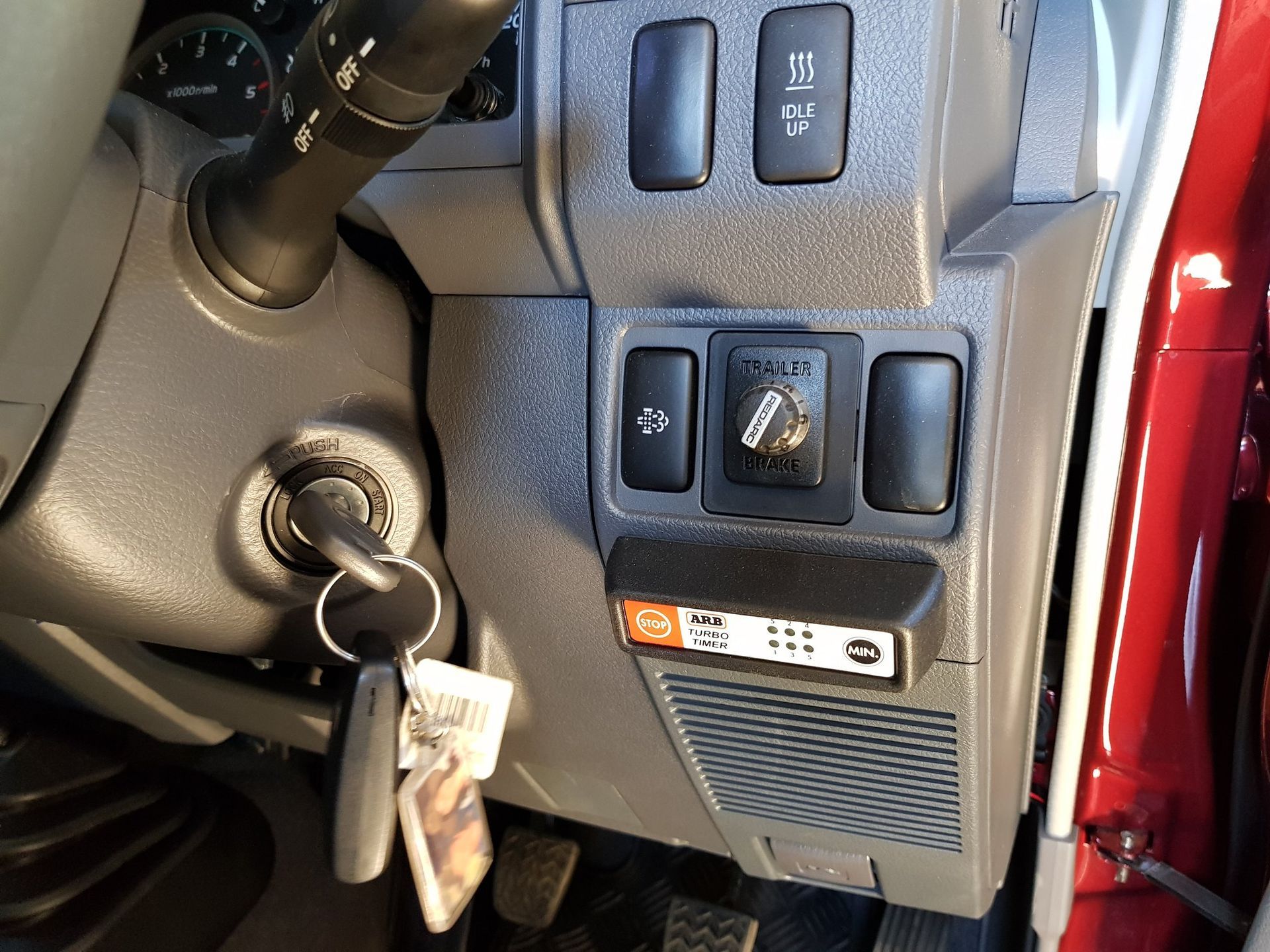 Dashboard With Ignition, Keys, Switches, and a Small Control Panel — A.M.D. Automotive Services in Moranbah, QLD