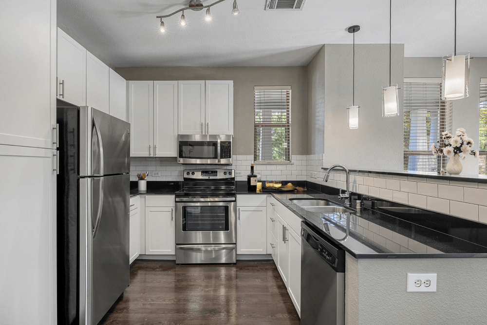 Modern Kitchen with High End Finishes at The Marquis of State Thomas