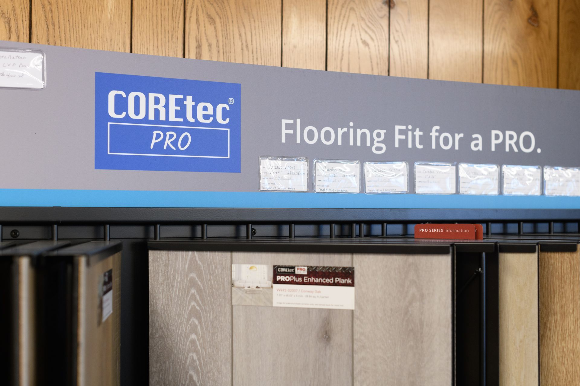 A sign that says coretec pro flooring fit for a pro