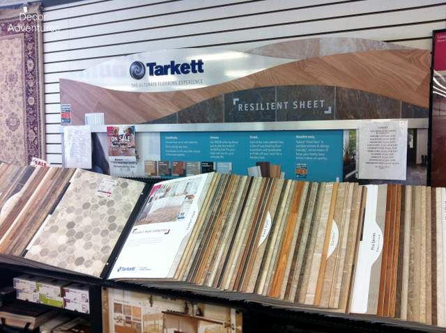A display of different types of flooring in a store. A display of different types of flooring in a store.