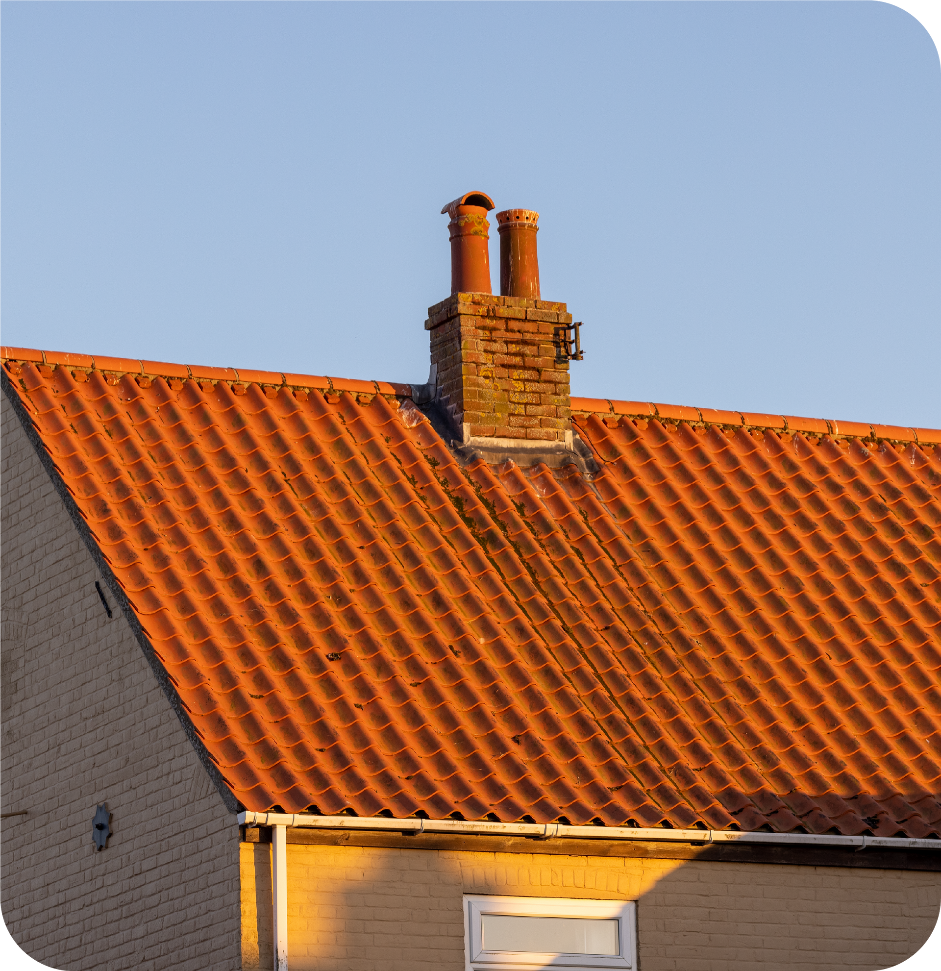 An attic with aluminum foil covering the ceiling