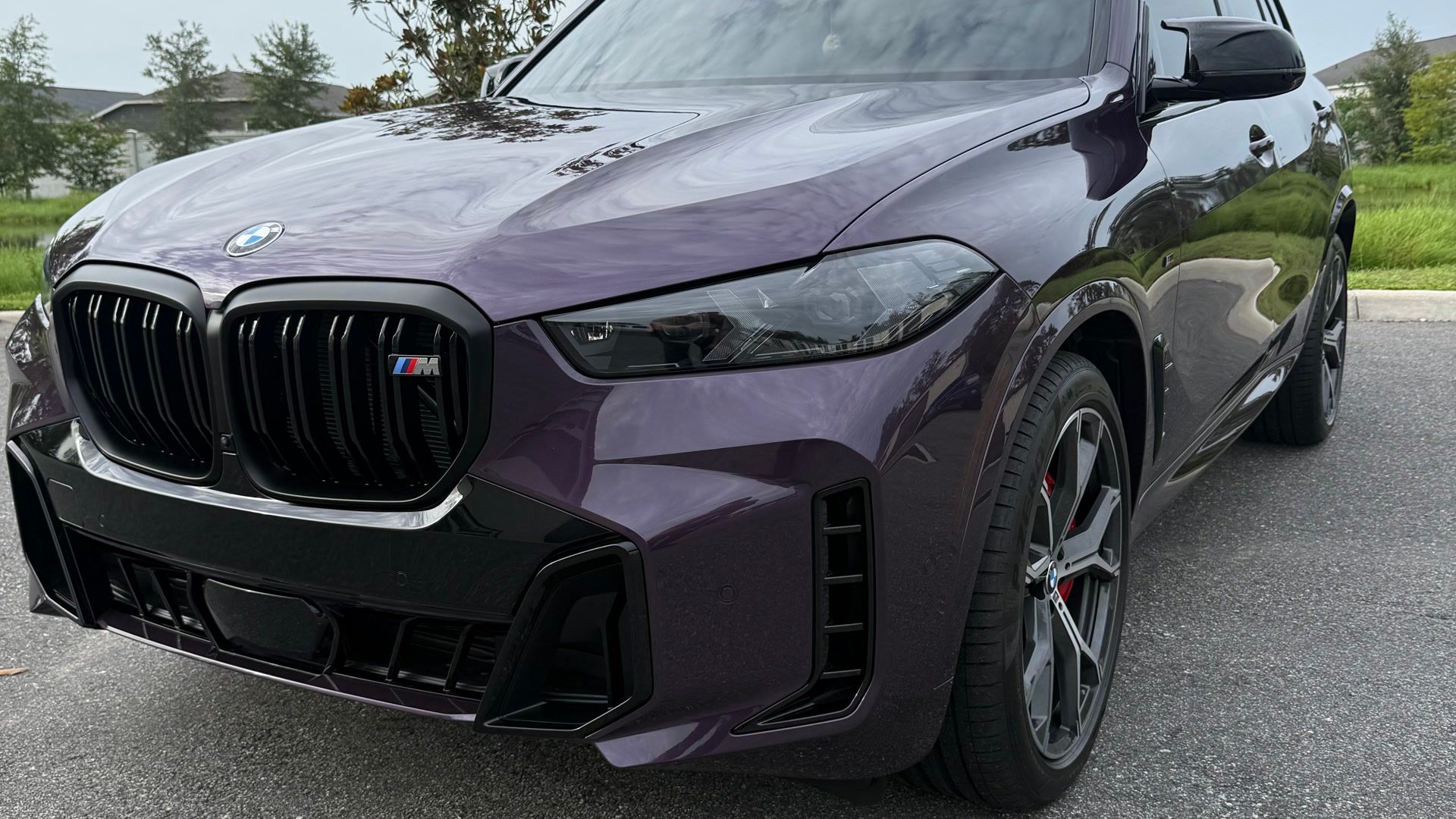 Purple 2026 BMW X5 with full body PPF and CARPRO ceramic coating, Wildwood FL