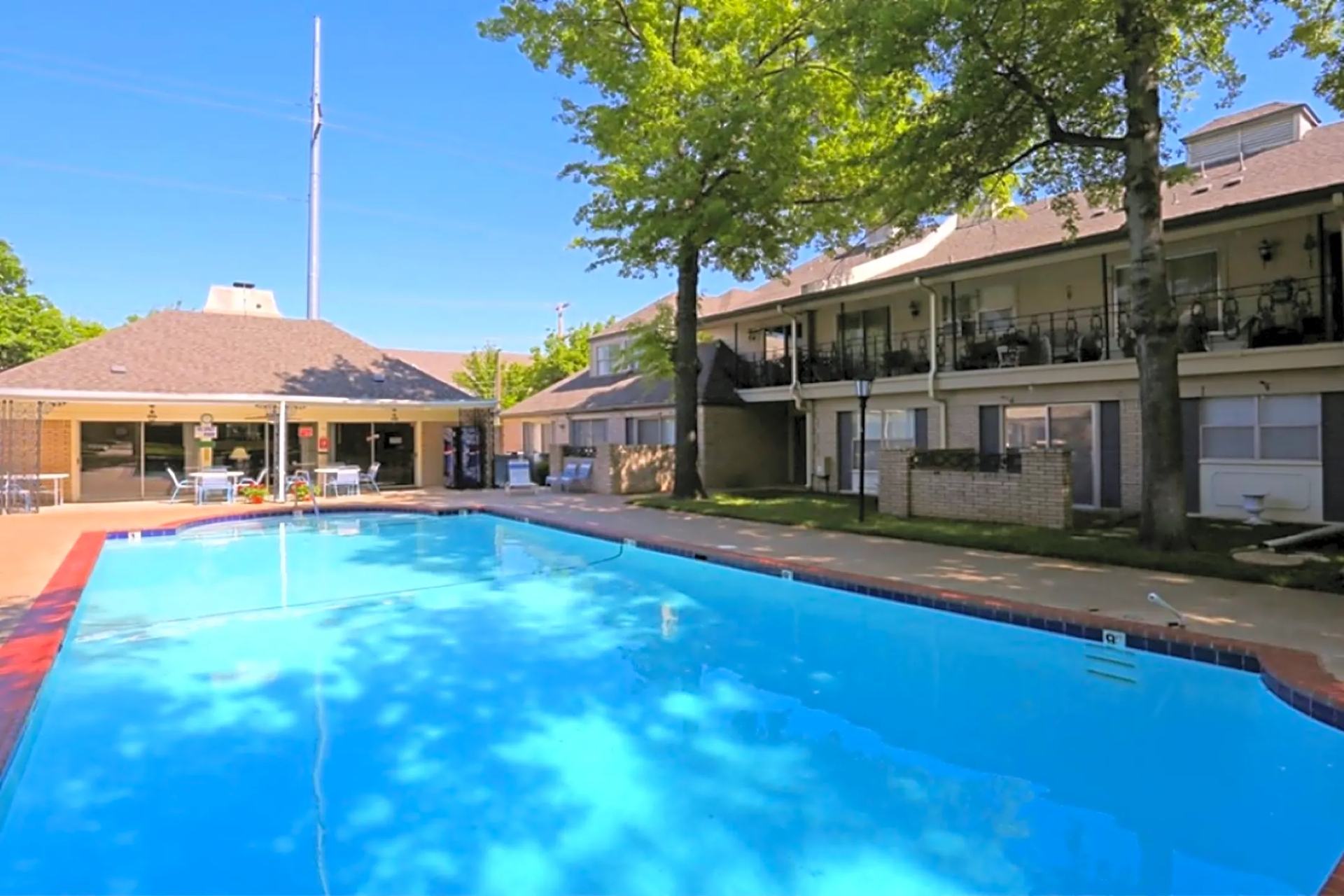 Pool Photo with apartments in view