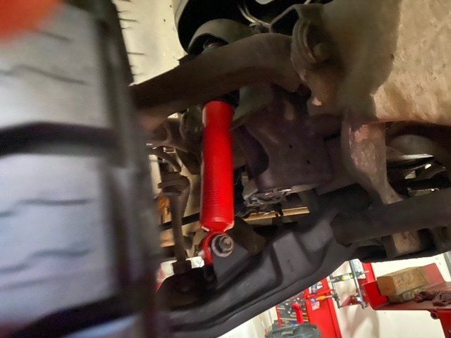 Close up photo of a red shock absorber