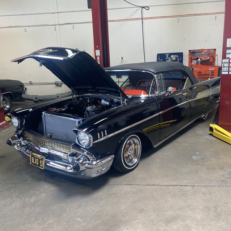 A Chevrolet Bel Air in a garage with its hood open | Trust JCR Performance for Auto & Car Engine Repairs in Sacramento, CA