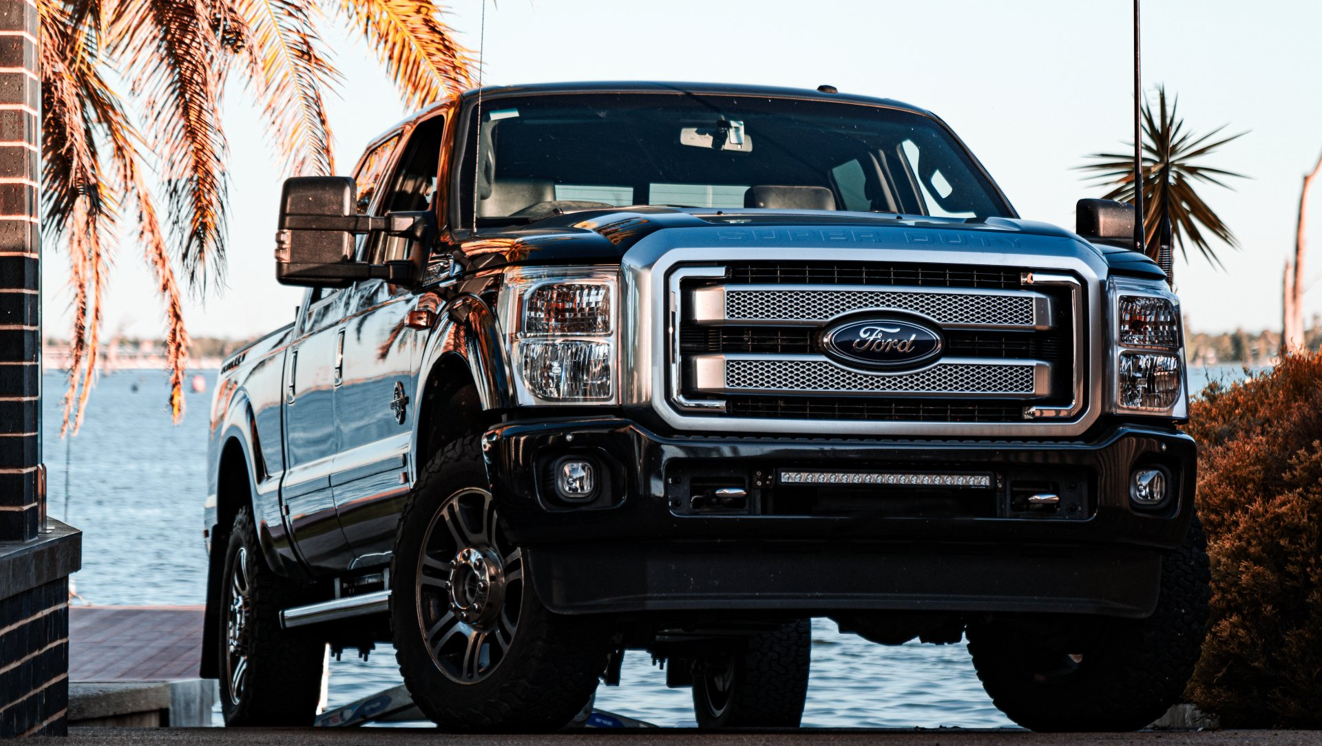 Ford Truck parked in front of a beach