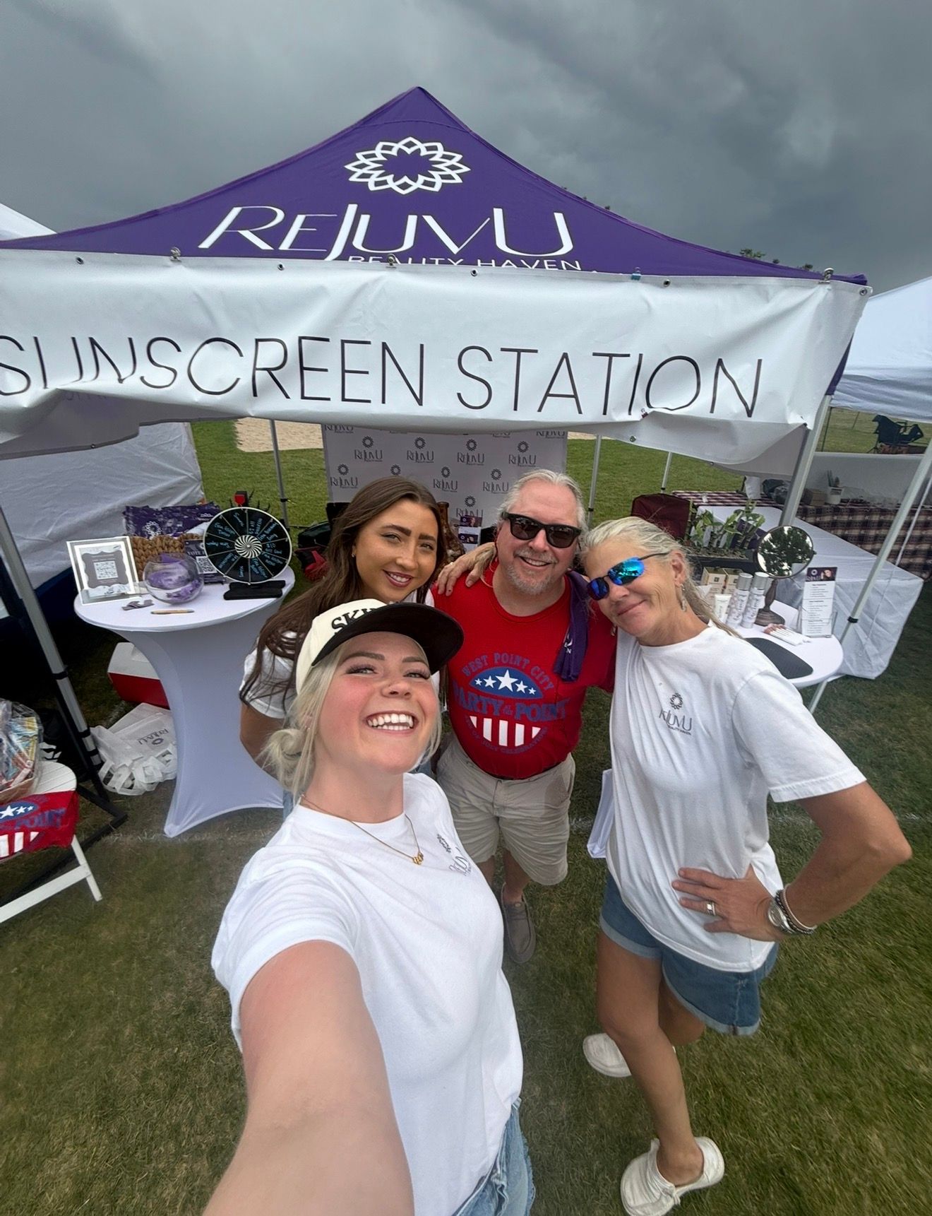 Medical spa team at community event West Point Utah