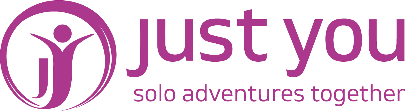 The logo for just you solo adventures together is purple and white.