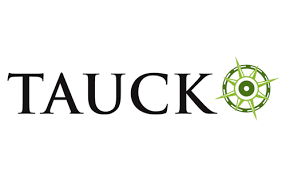 A logo for tauck with a green compass on a white background.
