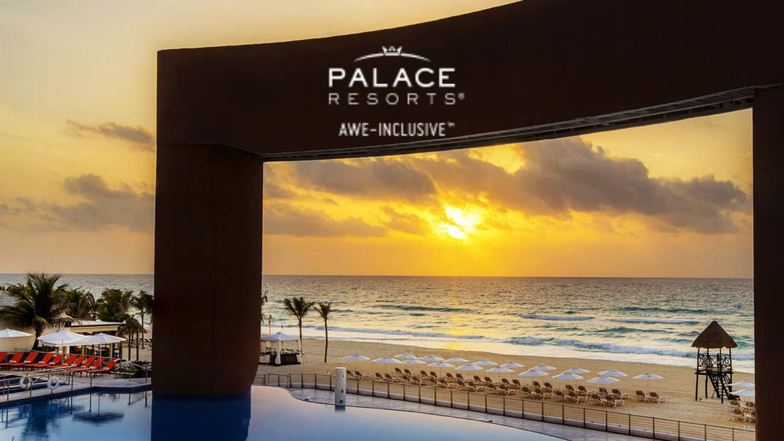The sun is setting over the ocean at palace resorts