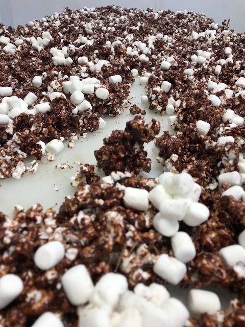 A pile of chocolate and marshmallows on a table