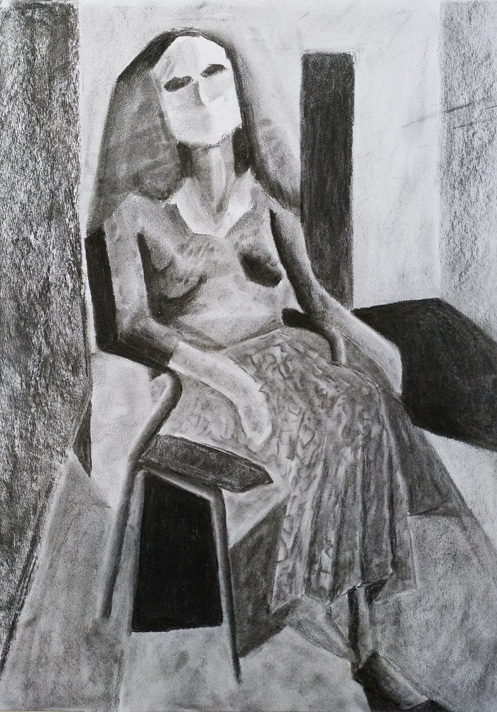 Self portrait drawing in charcoal on paper.