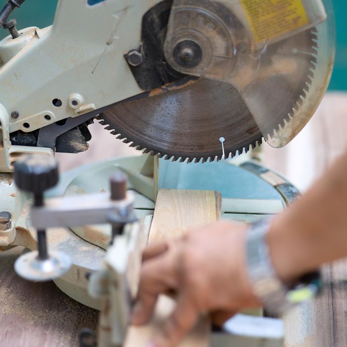 Close up of a small table saw being used