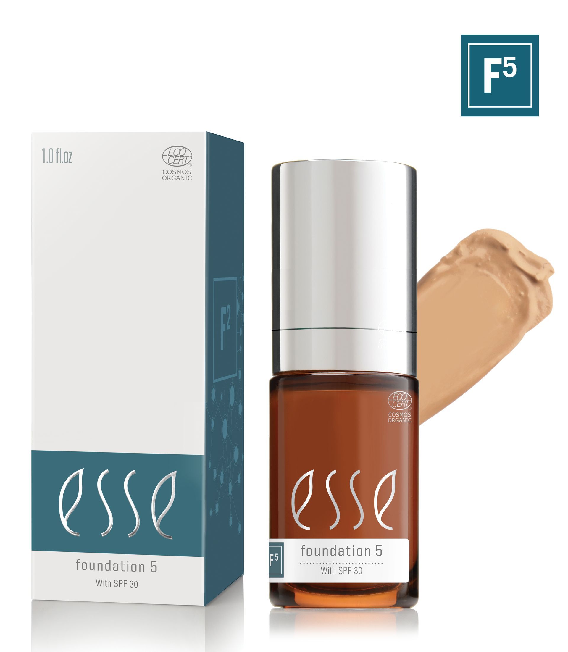 Fles en doos van Esse foundation, met rechts een beige make-upstaaltje.